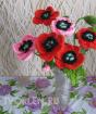 Crochet red poppies.  knitting patterns.  Poppies and daisies, and so on different crocheted flowers Crocheted poppy leaves diagram and description